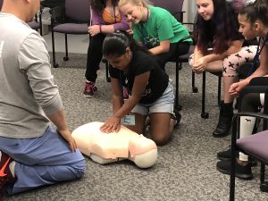 Inspire Upstate participant learning CPR