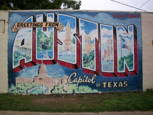 Mural that says greetings from Austin, capitol of Texas