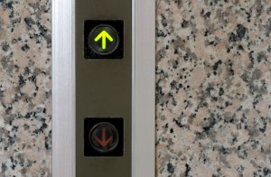 Illuminated elevator up button