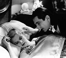 Dracula leaning over woman