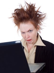 Angry crazy Business woman with a laptop