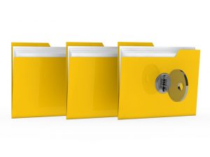 Set of three yellow folders with key unlocking them