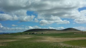 farm and rolling hills