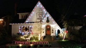 house with holiday lights and decorations