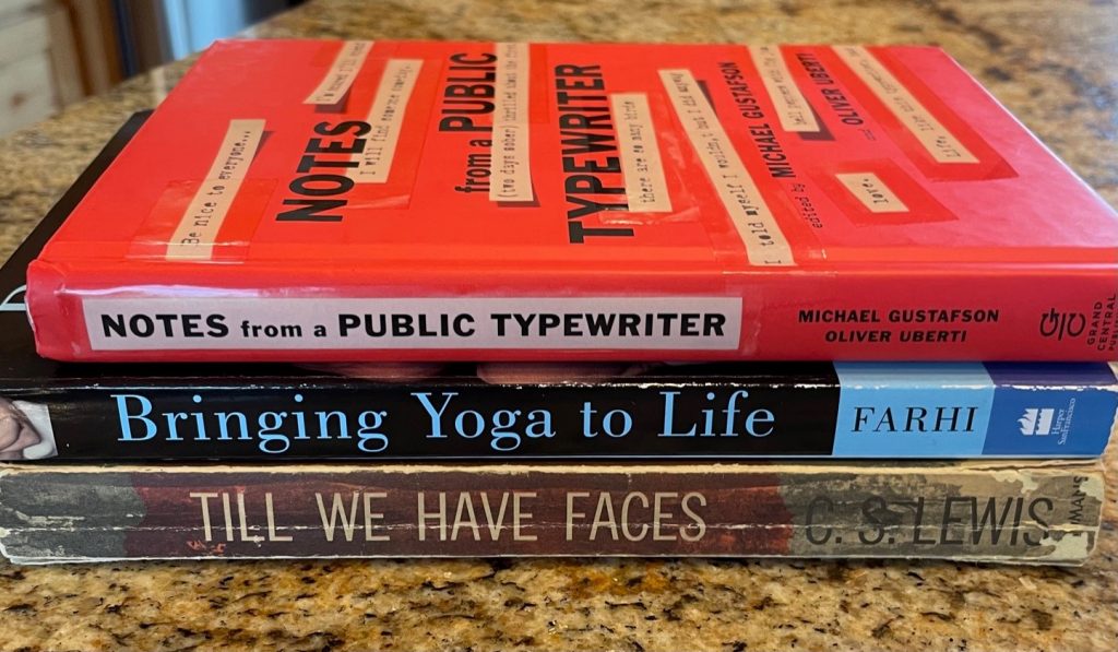 This book spine poem reads: Notes from a Public Typewriter, Bringing Yoga to Life, Till We Have faces