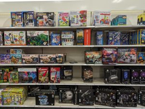 store shelf full of toys in boxes