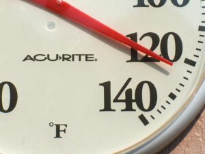 rounds thermometer indicating high temperatures 