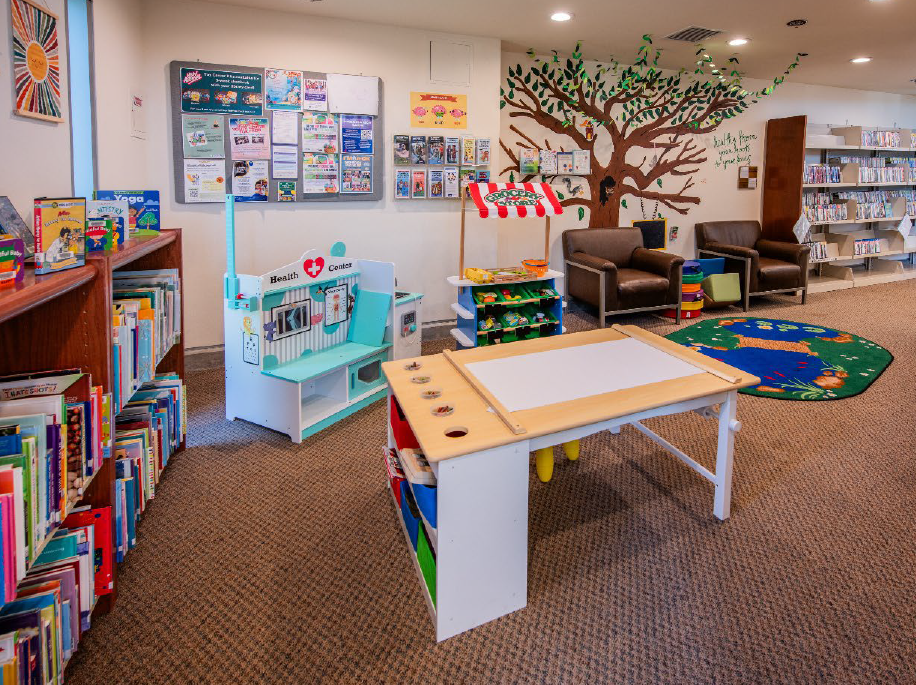 Grossmont library children's area with tables and books