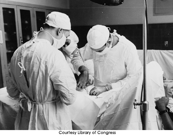 Surgeons perform a hernia operation at Provident Hospital, 1941.